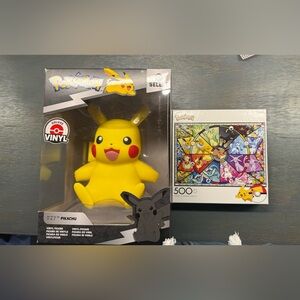 Set of Pokémon toys NWT pokemon pikachu 8” vinyl figure series 1 and puzzle